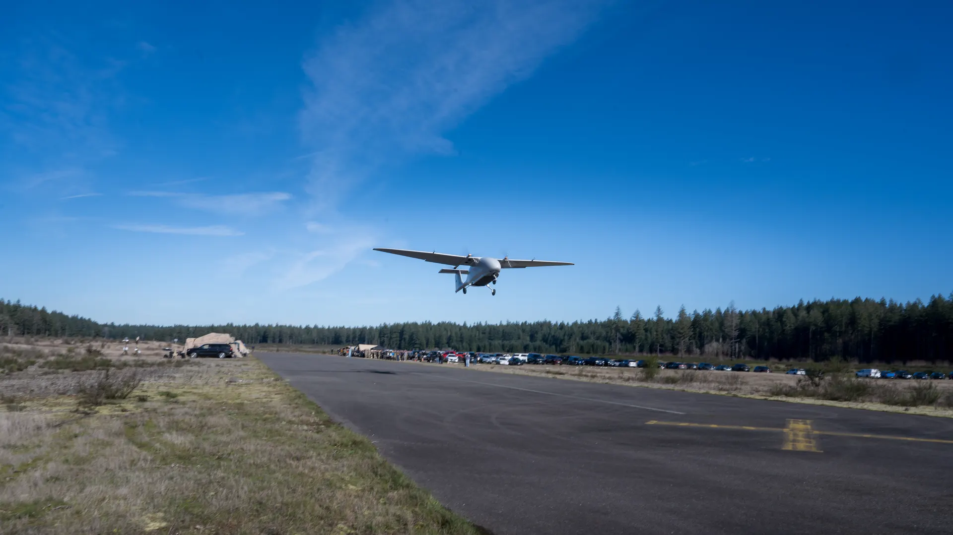 Fixed-wing UAS taking off from airstrip during Warfighter Ready field event