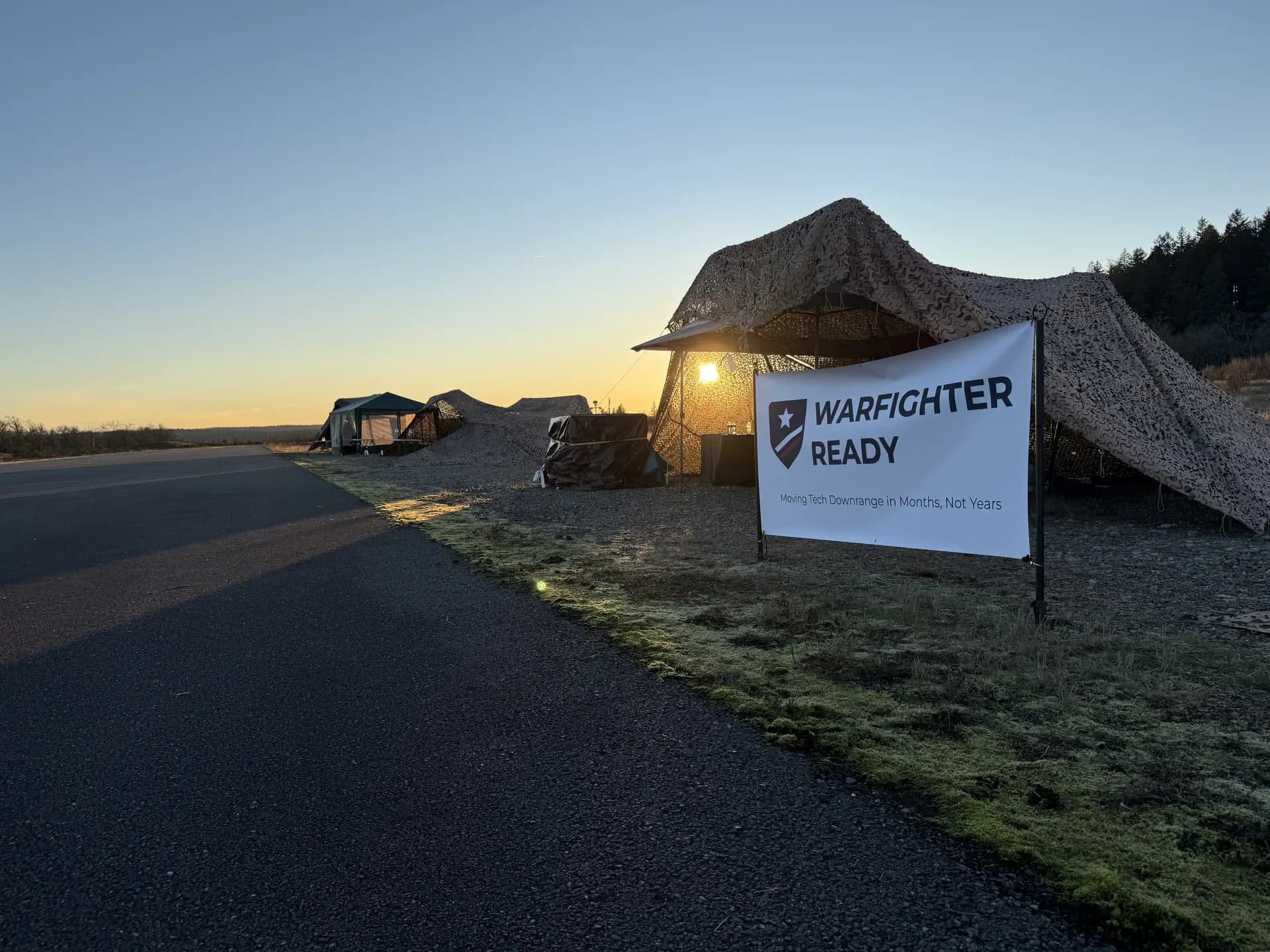 Warfighter Ready field event at sunrise on an airstrip